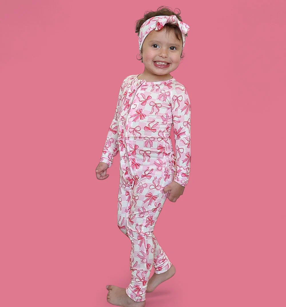 BOW CHECKERED CHARM DREAM RUFFLE ROMPER