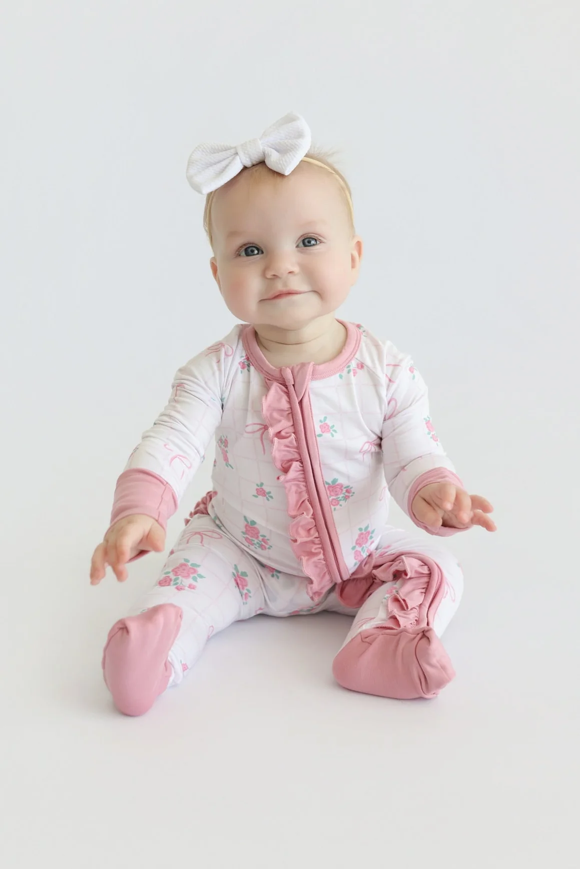 TIED WITH ROSES DREAM RUFFLE ROMPER